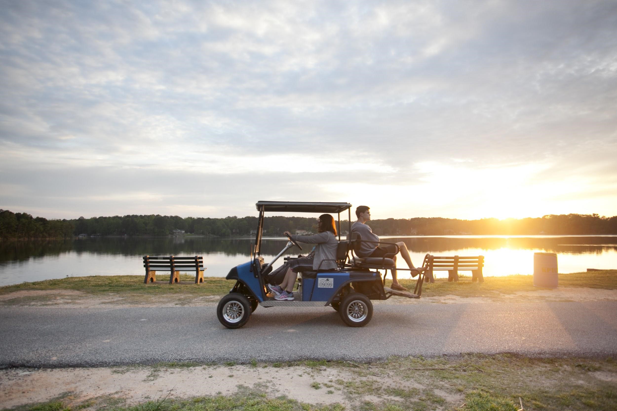 Explore Peachtree City's unique charm through its over 100 miles of golf cart pathways.